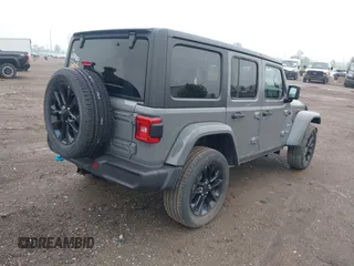 2023 Jeep Wrangler Sahara with VIN 1C4JJXP6XPW698886, listed as a IAAI auction lot 42439690 with 41,787 mi miles and . Bid and sale history available at DreamBid. Image 4.