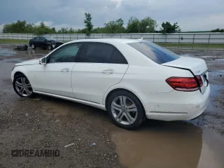 2014 Mercedes-Benz E 350 Sport with VIN WDDHF5KB8EA865027, listed as a Copart auction lot 53482265 with 166,648 mi miles and Salvage Title. Bid and sale history available at DreamBid. Image 2.