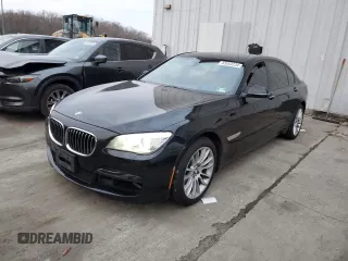 2014 BMW 7 Series 740Li xDrive with VIN WBAYF4C59ED281776, listed as a Copart auction lot 83563234 with 77,899 mi miles and Salvage Title. Bid and sale history available at carsss.com. Image 1.