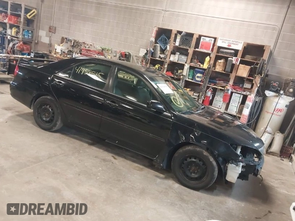 2003 Toyota Camry LE with VIN 4T1BE32K33U171859, listed as a IAAI auction lot 41938515 with 213,447 mi miles and . Bid and sale history available at DreamBid. Image 1.