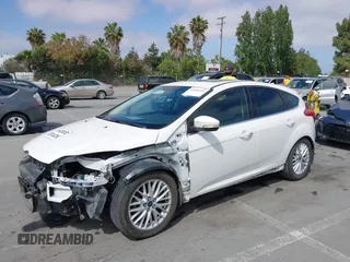 2014 Ford Focus Titanium with VIN 1FADP3N24EL186050, listed as a IAAI auction lot 42481684 with 187,687 mi miles and . Bid and sale history available at DreamBid. Image 6.