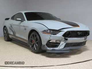 2023 Ford Mustang Mach 1 with VIN 1FA6P8R02P5502244, listed as a Copart auction lot 46698935 with 12,573 mi miles and Clean title. Bid and sale history available at DreamBid. Image 1.