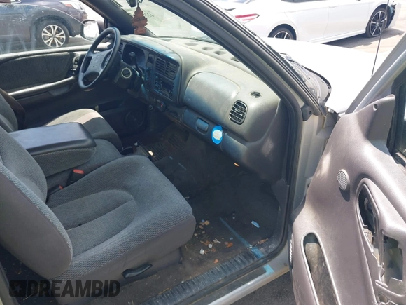 1999 Dodge Dakota SLT z VIN 1B7GL22X9XS258964, wystawiony jako IAAI lot #42309862 z przebiegiem 177 561 mil mil oraz . Historia ofert i sprzedaży dostępna na DreamBid. Obrazek 5.