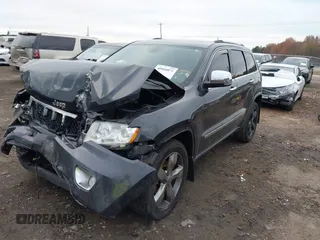 2012 Jeep Grand Cherokee Overland with VIN 1C4RJECT7CC334116, listed as a IAAI auction lot 40968071 with 98,794 mi miles. Bid and sale history available at carsss.com. Image 2.