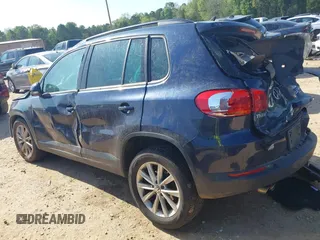 2015 Volkswagen Tiguan SE z VIN WVGBV7AX3FW583163, wystawiony jako IAAI lot #41991409 z przebiegiem 99 866 mil mil oraz . Historia ofert i sprzedaży dostępna na DreamBid. Obrazek 3.