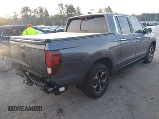 2020 Honda Ridgeline RTL-E with VIN 5FPYK3F70LB008292, listed as a IAAI auction lot 41357744 with 81,961 mi miles and . Bid and sale history available at DreamBid. Image 4.