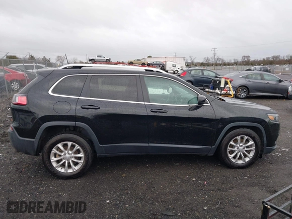 2019 Jeep Cherokee Latitude with VIN 1C4PJLCBXKD357403, listed as a IAAI auction lot 41606497 with 104,102 mi miles and . Bid and sale history available at carsss.com. Image 13.