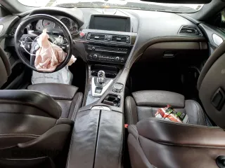 2015 BMW M6 z VIN WBS6C9C58FD467982, wystawiony jako Copart lot #78689983 z przebiegiem Nie podano mil oraz Szkody całkowita. Historia ofert i sprzedaży dostępna na DreamBid. Obrazek 8.