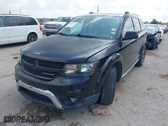 2015 Dodge Journey Crossroad with VIN 3C4PDCGB2FT713389, listed as a IAAI auction lot 42103272 with 135,974 mi miles and . Bid and sale history available at DreamBid. Image 2.