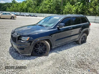 2018 Jeep Grand Cherokee Limited with VIN 1C4RJFBT3JC227374, listed as a Copart auction lot 61449815 with 123,171 mi miles and Salvage title. Bid and sale history available at DreamBid. Image 1.