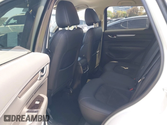 2018 Mazda CX-5 Touring with VIN JM3KFACM0J0416716, listed as a IAAI auction lot 42150121 with 61,332 mi miles and . Bid and sale history available at carsss.com. Image 8.