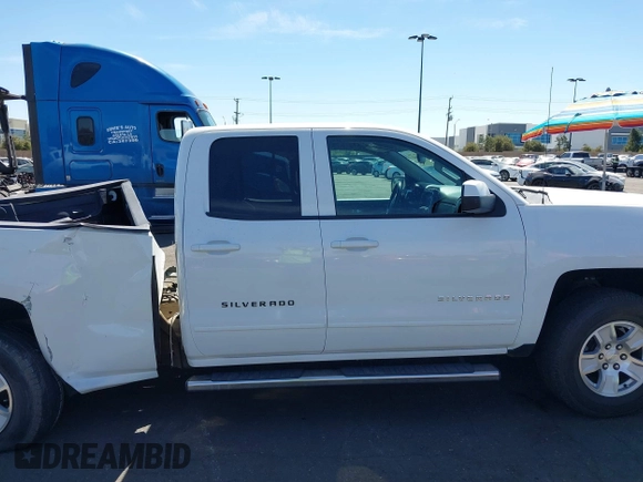 2018 Chevrolet Silverado 1500 LT with VIN 1GCRCREH5JZ168411, listed as a IAAI auction lot 41885403 with 37,449 mi miles and . Bid and sale history available at DreamBid. Image 13.
