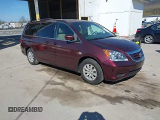 2009 Honda Odyssey EX-L with VIN 5FNRL38619B040594, listed as a IAAI auction lot 42037189 with 189,677 mi miles. Bid and sale history available at carsss.com. Image 1.