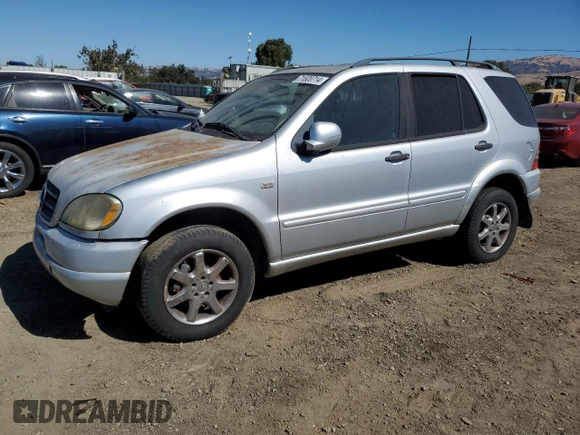 2000 Mercedes-Benz M 320/430/500 with VIN 4JGAB72E5YA173269, listed as a Copart auction lot 71520714 with 239,248 mi miles and Clean title. Bid and sale history available at DreamBid. Image 1.