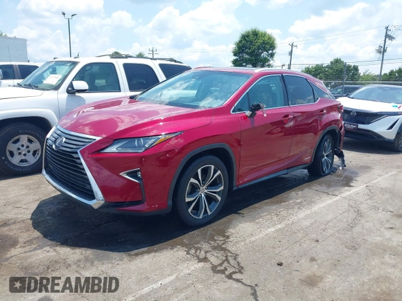 2016 Lexus RX 450h with VIN 2T2BGMCA1GC007583, listed as a IAAI auction lot 42590022 with 152,810 mi miles and . Bid and sale history available at DreamBid. Image 18.