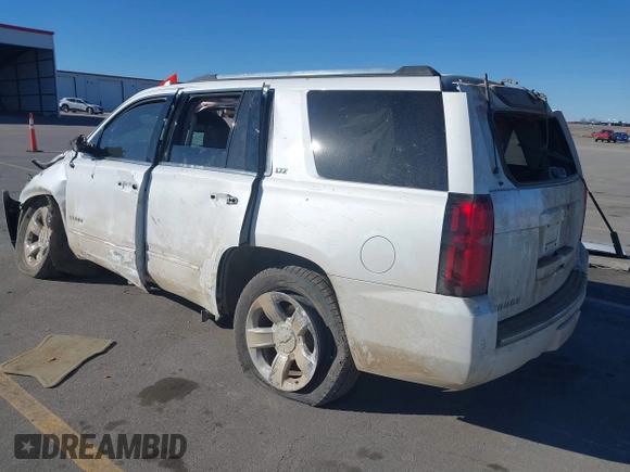 2016 Chevrolet Tahoe LTZ z VIN 1GNSKCKC0GR214110, wystawiony jako IAAI lot #41680822 z przebiegiem 60 271 mil mil oraz . Historia ofert i sprzedaży dostępna na DreamBid. Obrazek 3.