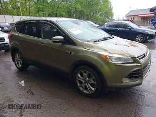 2013 Ford Escape SEL with VIN 1FMCU9HX2DUB52251, listed as a IAAI auction lot 42253659 with Not provided miles and . Bid and sale history available at DreamBid. Image 1.