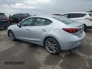 2018 Mazda 3 Touring z VIN 3MZBN1V38JM206424, wystawiony jako Copart lot #57914015 z przebiegiem 93 095 mil mil oraz Szkoda całkowita • Salvage title. Historia ofert i sprzedaży dostępna na DreamBid. Obrazek 2.