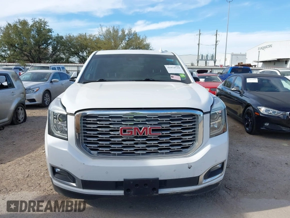 2019 GMC Yukon XL Denali with VIN 1GKS1HKJ8KR378385, listed as a IAAI auction lot 41824529 with 115,481 mi miles. Bid and sale history available at carsss.com. Image 12.