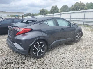 2018 Toyota C-HR XLE z VIN NMTKHMBX7JR004515, wystawiony jako Copart lot #57106385 z przebiegiem Nie podano mil oraz Szkoda całkowita • Salvage title. Historia ofert i sprzedaży dostępna na DreamBid. Obrazek 3.