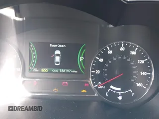 2012 Kia Optima Hybrid with VIN KNAGM4AD6C5015831, listed as a IAAI auction lot 41807913 with 156,197 mi miles. Bid and sale history available at carsss.com. Image 7.