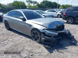 2019 BMW M5 Competition z VIN WBSJF0C50KB285924, wystawiony jako IAAI lot #41686677 z przebiegiem 44 238 mil mil oraz . Historia ofert i sprzedaży dostępna na DreamBid. Obrazek 1.