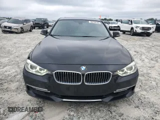 2014 BMW 3 Series 328i with VIN WBA3A5G54ENP31997, listed as a Copart auction lot 60720765 with 107,183 mi miles and Salvage title. Bid and sale history available at DreamBid. Image 5.