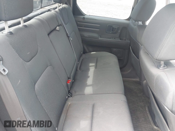 2014 Honda Ridgeline Sport with VIN 5FPYK1F71EB003710, listed as a IAAI auction lot 42777931 with 126,755 mi miles and . Bid and sale history available at DreamBid. Image 8.
