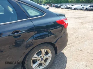 2014 Ford Focus SE with VIN 1FADP3F24EL431332, listed as a IAAI auction lot 42135538 with 121,362 mi miles. Bid and sale history available at carsss.com. Image 6.