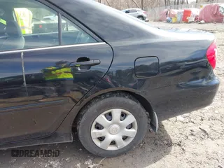 2004 Toyota Camry LE with VIN 4T1BE32K94U307994, listed as a IAAI auction lot 41847450 with 164,016 mi miles and . Bid and sale history available at carsss.com. Image 6.