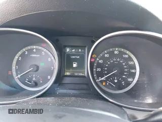 2018 Hyundai Santa Fe 2.4L z VIN 5XYZTDLB9JG513584, wystawiony jako IAAI lot #42031291 z przebiegiem 131 109 mil mil oraz . Historia ofert i sprzedaży dostępna na DreamBid. Obrazek 7.
