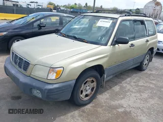 2001 Subaru Forester L with VIN JF1SF63511G703834, listed as a IAAI auction lot 41904604 with 137,225 mi miles. Bid and sale history available at carsss.com. Image 2.