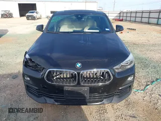 2020 BMW X2 xDrive28i with VIN WBXYJ1C02L5P31038, listed as a IAAI auction lot 41338219 with 72,854 mi miles. Bid and sale history available at carsss.com. Image 12.