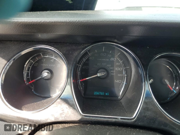 2012 Ford Taurus Limited with VIN 1FAHP2JW1CG141710, listed as a Copart auction lot 72746064 with 206,760 mi miles and Salvage title. Bid and sale history available at DreamBid. Image 9.