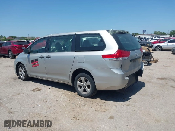 2014 Toyota Sienna L with VIN 5TDZK3DC1ES410012, listed as a IAAI auction lot 42005001 with 440,789 mi miles. Bid and sale history available at carsss.com. Image 3.