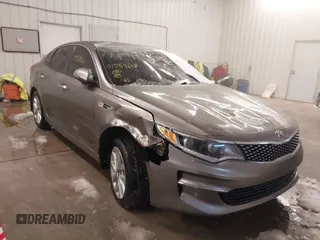 2017 Kia Optima EX with VIN 5XXGU4L36HG143321, listed as a IAAI auction lot 41589617 with 116,972 mi miles. Bid and sale history available at carsss.com. Image 1.