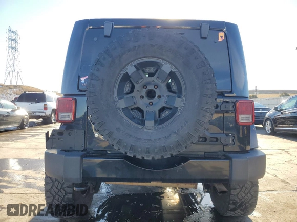 2016 Jeep Wrangler Unlimited 75th Anniversary with VIN 1C4BJWEG7GL113824, listed as a Copart auction lot 81372864 with 98,497 mi miles and Salvage title. Bid and sale history available at DreamBid. Image 6.