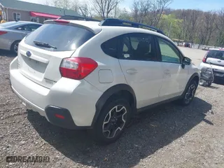 2016 Subaru Crosstrek Premium with VIN JF2GPABC9G8291540, listed as a IAAI auction lot 42102429 with 212,701 mi miles. Bid and sale history available at carsss.com. Image 4.
