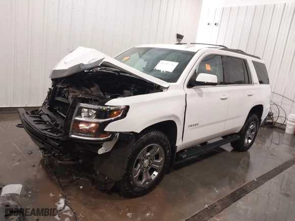 2019 Chevrolet Tahoe LT with VIN 1GNSKBKC5KR280204, listed as a IAAI auction lot 41901606 with 72,919 mi miles. Bid and sale history available at carsss.com. Image 20.
