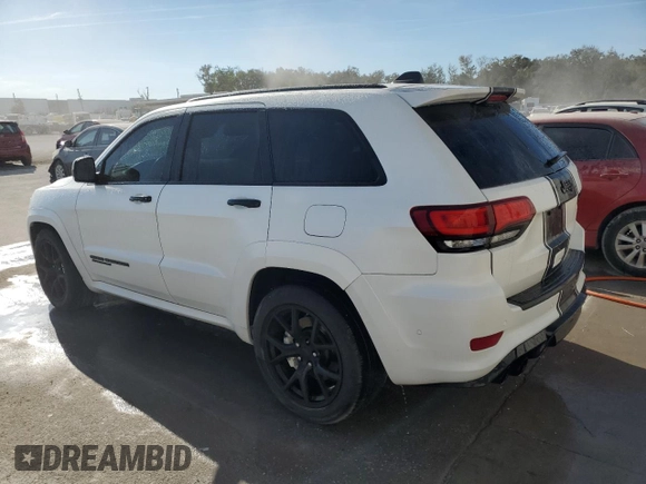 2019 Jeep Grand Cherokee Trackhawk with VIN 1C4RJFN92KC564748, listed as a Copart auction lot 82677504 with 48,528 mi miles and Salvage title. Bid and sale history available at DreamBid. Image 2.