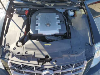 2009 Cadillac STS AWD z VIN 1G6DD67V690120833, wystawiony jako Copart lot #42502345 z przebiegiem 100 250 mil mil oraz Szkoda całkowita • Salvage title. Historia ofert i sprzedaży dostępna na DreamBid. Obrazek 13.