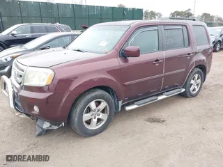 2009 Honda Pilot EX-L with VIN 5FNYF48569B018445, listed as a IAAI auction lot 41808595 with 999,999 mi miles. Bid and sale history available at carsss.com. Image 2.