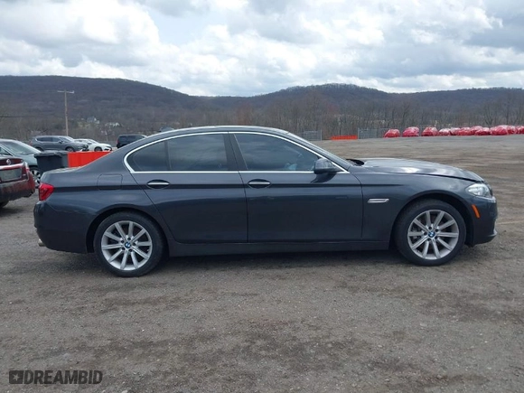2015 BMW 5 Series 535i xDrive with VIN WBA5B3C58FD544771, listed as a IAAI auction lot 41395701 with 102,975 mi miles. Bid and sale history available at carsss.com. Image 12.