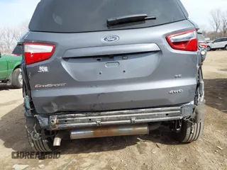 2021 Ford EcoSport SE z VIN MAJ6S3GL1MC425050, wystawiony jako IAAI lot #41808554 z przebiegiem 63 785 mil mil oraz . Historia ofert i sprzedaży dostępna na DreamBid. Obrazek 6.