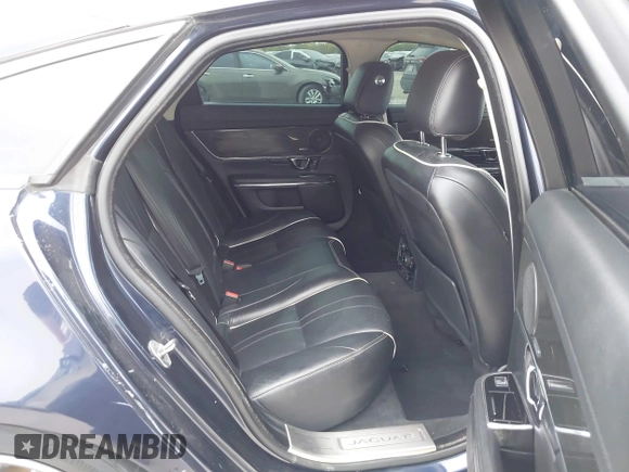 2018 Jaguar XJ R-Sport with VIN SAJWA1C74J8W14026, listed as a IAAI auction lot 42032719 with 95,263 mi miles and . Bid and sale history available at DreamBid. Image 8.