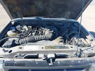 2003 Ford Ranger XL with VIN 1FTYR10D43PB74179, listed as a IAAI auction lot 41697965 with 290,897 mi miles. Bid and sale history available at carsss.com. Image 10.
