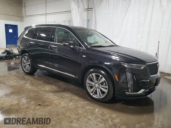 2022 Cadillac XT6 Premium Luxury with VIN 1GYKPFRS0NZ154930, listed as a Copart auction lot 88454595 with 26,334 mi miles and Salvage Title. Bid and sale history available at carsss.com. Image 4.