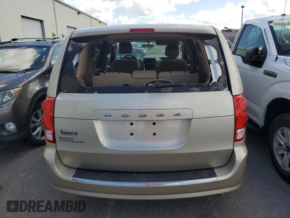 2015 Dodge Grand Caravan SE with VIN 2C4RDGBGXFR613918, listed as a Copart auction lot 75124864 with 27,822 mi miles and Salvage Title. Bid and sale history available at DreamBid. Image 6.