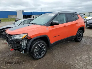 2021 Jeep Compass Trailhawk z VIN 3C4NJDDB5MT589223, wystawiony jako Copart lot #65392765 z przebiegiem 141 919 mil mil oraz Czysty tytuł • Clean title. Historia ofert i sprzedaży dostępna na DreamBid. Obrazek 1.