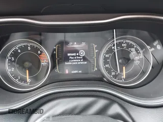 2021 Jeep Cherokee Altitude z VIN 1C4PJLLB0MD155026, wystawiony jako IAAI lot #42204298 z przebiegiem 63 491 mil mil oraz . Historia ofert i sprzedaży dostępna na DreamBid. Obrazek 7.